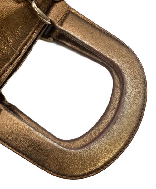 Yves Saint Laurent（イヴサンローラン）Yves Saint Laurent (イヴサンローラン) ハンドバッグ ゴールドの古着・服飾アイテム