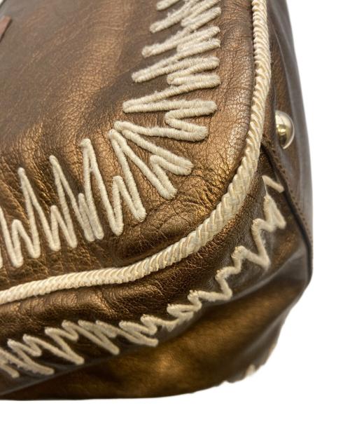 Yves Saint Laurent（イヴサンローラン）Yves Saint Laurent (イヴサンローラン) ハンドバッグ ゴールドの古着・服飾アイテム