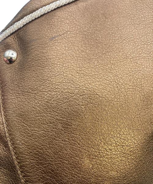 Yves Saint Laurent（イヴサンローラン）Yves Saint Laurent (イヴサンローラン) ハンドバッグ ゴールドの古着・服飾アイテム