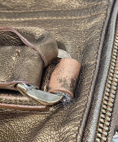 Yves Saint Laurent（イヴサンローラン）Yves Saint Laurent (イヴサンローラン) ハンドバッグ ゴールドの古着・服飾アイテム