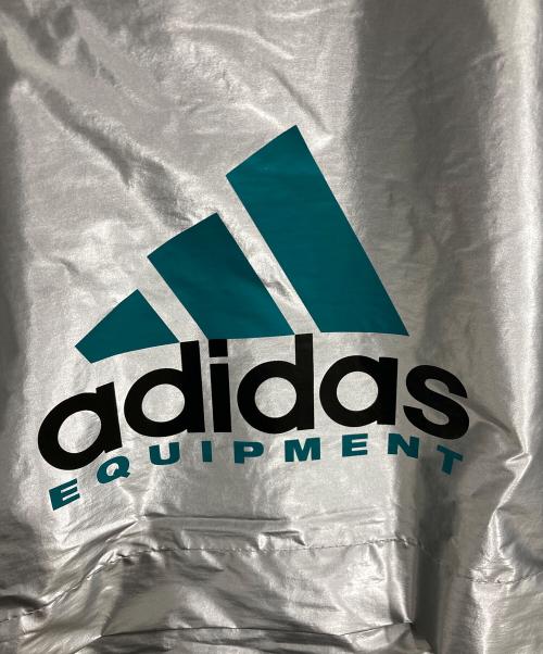 adidas（アディダス）adidas (アディダス) エキップメント メタリック ウインドブレーカー シルバー サイズ:M 未使用品の古着・服飾アイテム