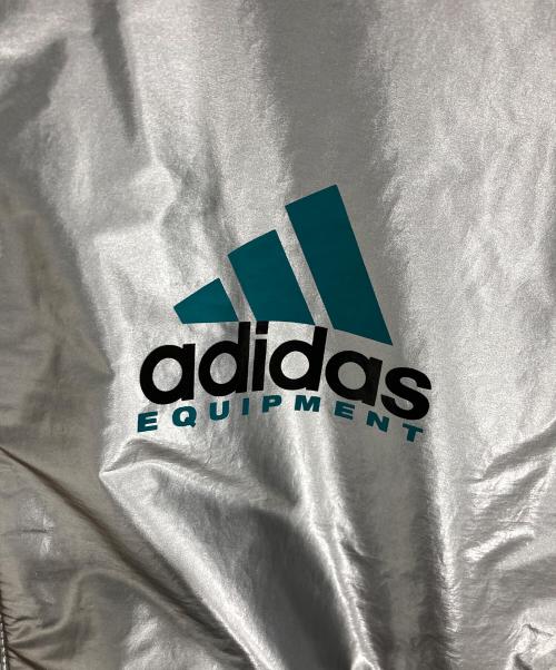 adidas（アディダス）adidas (アディダス) エキップメント メタリック ウインドブレーカー シルバー サイズ:M 未使用品の古着・服飾アイテム