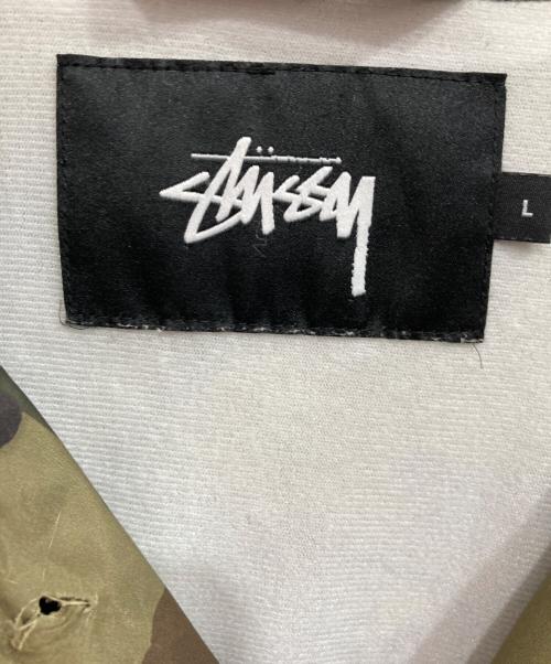 stussy（ステューシー）stussy (ステューシー) カモ柄コーチジャケット グリーン サイズ:Ｌの古着・服飾アイテム