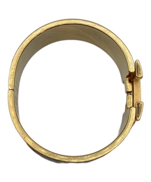 HERMES（エルメス）HERMES (エルメス) クリッククラック H ブレスレット ブラック×ゴールドの古着・服飾アイテム