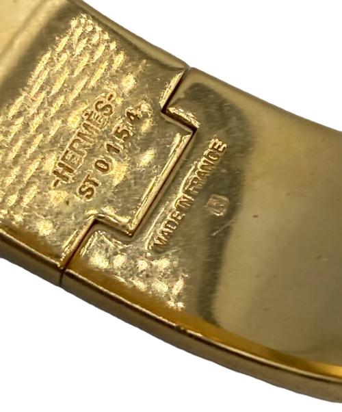 HERMES（エルメス）HERMES (エルメス) クリッククラック H ブレスレット ブラック×ゴールドの古着・服飾アイテム