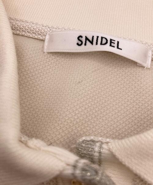 Snidel（スナイデル）Snidel (スナイデル) メタルボタンパフスリーブポロ アイボリー サイズ:Fの古着・服飾アイテム