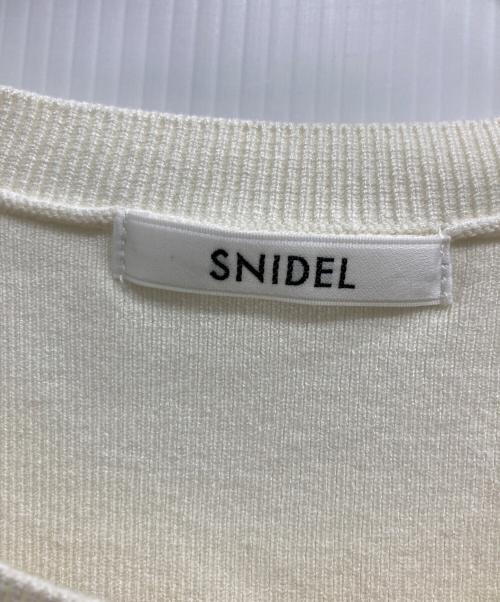 Snidel（スナイデル）Snidel (スナイデル) フルーツボタンパフニットカーディガン ホワイト サイズ:F 未使用品の古着・服飾アイテム