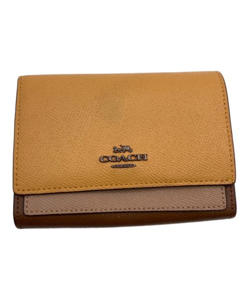 COACH（コーチ）COACH (コーチ) 2つ折り財布 イエロー×ブラウンの古着・服飾アイテム