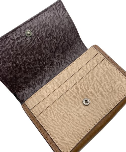 COACH（コーチ）COACH (コーチ) 2つ折り財布 イエロー×ブラウンの古着・服飾アイテム