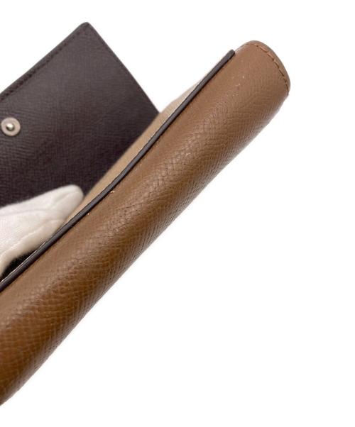 COACH（コーチ）COACH (コーチ) 2つ折り財布 イエロー×ブラウンの古着・服飾アイテム