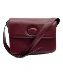 Cartier（カルティエ）の古着「マストライン ターンロックショルダーバッグ」｜レッド