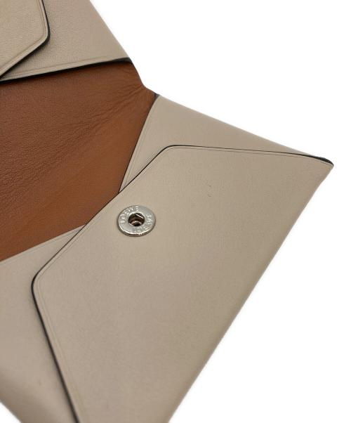 LOEWE（ロエベ）LOEWE (ロエベ) パンチングアナグラムカードケース/バイフォールド カードケース ベージュの古着・服飾アイテム