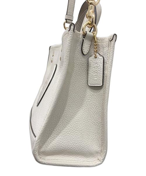 COACH（コーチ）COACH (コーチ) 2WAYバッグDempsey Tote 22） アイボリーの古着・服飾アイテム