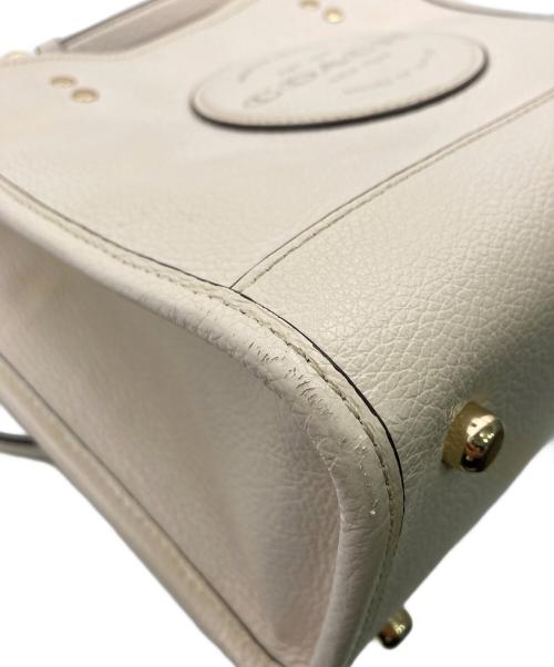 COACH（コーチ）COACH (コーチ) 2WAYバッグDempsey Tote 22） アイボリーの古着・服飾アイテム