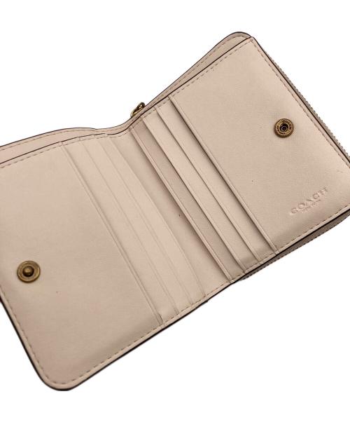 COACH（コーチ）COACH (コーチ) ビルフォールド・ウォレット・チェリープリント アイボリーの古着・服飾アイテム