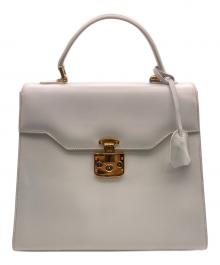 GUCCI（グッチ）の古着「レディロックハンドバッグ」｜ホワイト