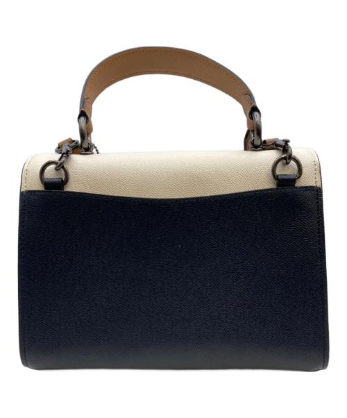 COACH（コーチ）COACH (コーチ) レザー ティリー トップ ハンドル ターンロック クロスボディ 2WAYバッグ ホワイト×ネイビーの古着・服飾アイテム