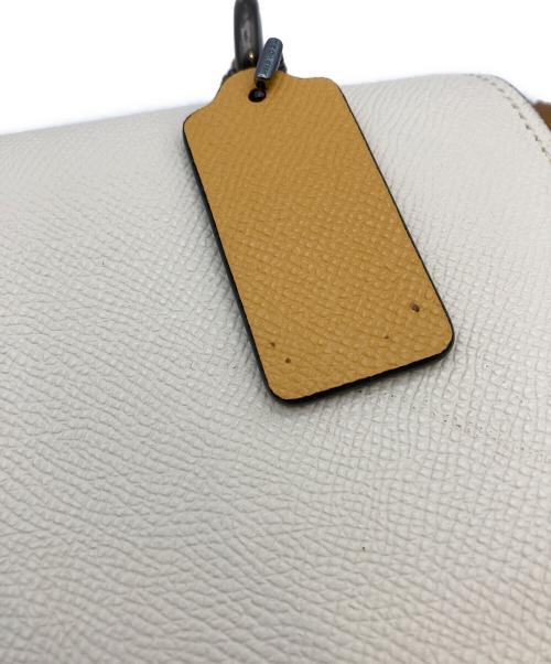 COACH（コーチ）COACH (コーチ) レザー ティリー トップ ハンドル ターンロック クロスボディ 2WAYバッグ ホワイト×ネイビーの古着・服飾アイテム