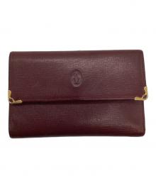 Cartier（カルティエ）の古着「3つ折り財布」｜レッド