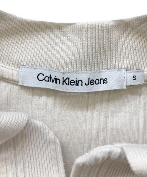Calvin Klein（カルバンクライン）Calvin Klein (カルバンクライン) 長袖クロップトップス アイボリー サイズ:Sの古着・服飾アイテム