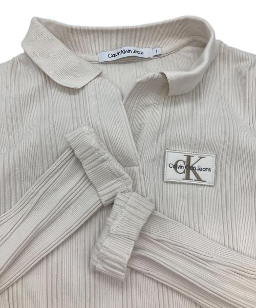 Calvin Klein（カルバンクライン）Calvin Klein (カルバンクライン) 長袖クロップトップス アイボリー サイズ:Sの古着・服飾アイテム