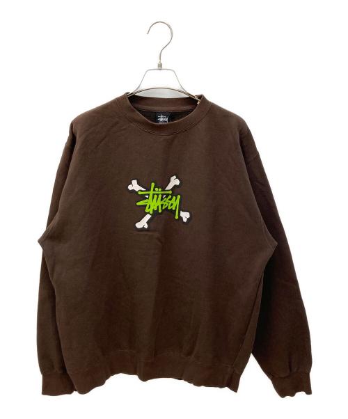 stussy（ステューシー）stussy (ステューシー) クロスボーンプリントスウェット ブラウン サイズ:Mの古着・服飾アイテム