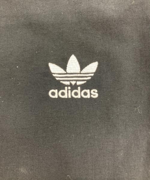 adidas（アディダス）adidas (アディダス) アディカラー ウーブン ファイヤーバード トラックトップ ブラック サイズ:XLの古着・服飾アイテム