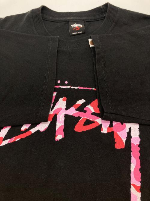 stussy（ステューシー）stussy (ステューシー) A BATHING APE (ア ベイシング エイプ) ABCカモ30周年コラボTシャツ ブラック×ピンク サイズ:Sの古着・服飾アイテム