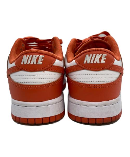 NIKE（ナイキ）NIKE (ナイキ) スニーカー オレンジ×ホワイト サイズ:27の古着・服飾アイテム