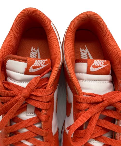 NIKE（ナイキ）NIKE (ナイキ) スニーカー オレンジ×ホワイト サイズ:27の古着・服飾アイテム