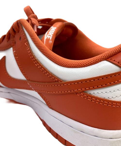 NIKE（ナイキ）NIKE (ナイキ) スニーカー オレンジ×ホワイト サイズ:27の古着・服飾アイテム