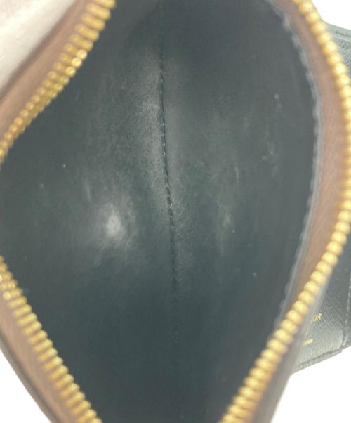 LOUIS VUITTON（ルイ ヴィトン）LOUIS VUITTON (ルイ ヴィトン) ポルトフォイユ・ヴィクトリーヌ モノグラム・リバース /3つ折り財布 ブラウンの古着・服飾アイテム
