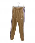 adidasアディダス）の古着「トラックパンツ」｜ベージュ