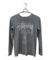 stussy（ステューシー）の古着「WORLD TOUR L/S TEE」｜グレー
