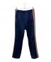 Needles（ニードルズ）の古着「ラインパンツ」｜ネイビー