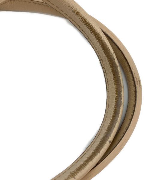 LONGCHAMP（ロンシャン）LONGCHAMP (ロンシャン) リバーシブルレザートートバッグ ベージュ×レッドの古着・服飾アイテム