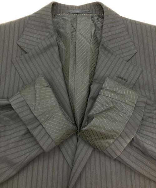 GIANNI VERSACE（ジャンニ・ヴェルサーチ）GIANNI VERSACE (ジャンニ・ヴェルサーチ) 2Bセットアップスーツ ネイビー サイズ:44の古着・服飾アイテム