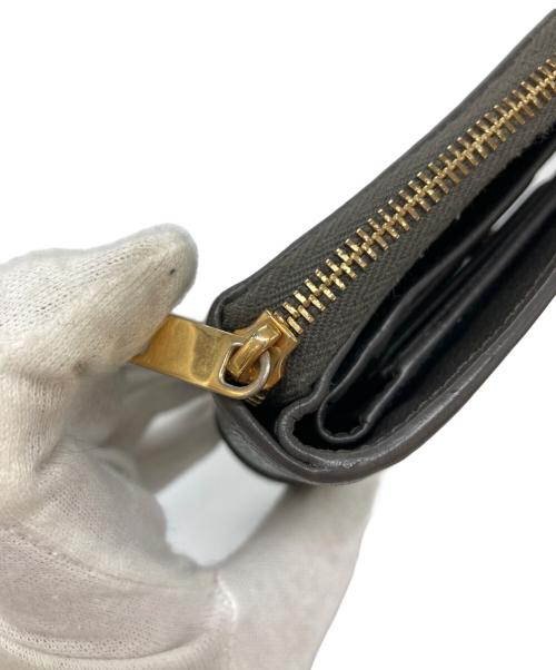 Yves Saint Laurent（イヴサンローラン）Yves Saint Laurent (イヴサンローラン) 2つ折り財布 グレーの古着・服飾アイテム