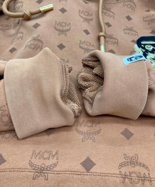 A BATHING APE（ア ベイシング エイプ）A BATHING APE (ア ベイシング エイプ) MCM (エムシーエム) モノグラム総柄シャークフーディ ブラウン サイズ:XLの古着・服飾アイテム