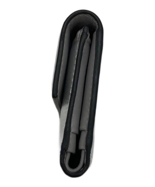 VALENTINO GARAVANI（ヴァレンティノ・ガラヴァーニ）VALENTINO GARAVANI (ヴァレンティノ・ガラヴァーニ) 3つ折り財布 シルバーの古着・服飾アイテム