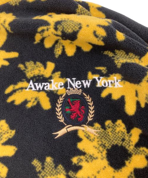 AWAKE（アウェイク）AWAKE (アウェイク) TOMMY JEANS (トミージーンズ) フラワーデザインフリースジャケット イエロー×ブラック サイズ:Lの古着・服飾アイテム