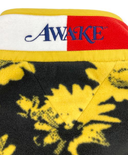 AWAKE（アウェイク）AWAKE (アウェイク) TOMMY JEANS (トミージーンズ) フラワーデザインフリースジャケット イエロー×ブラック サイズ:Lの古着・服飾アイテム