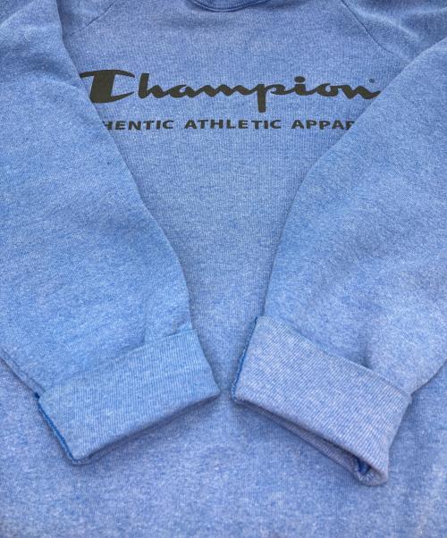 Champion（チャンピオン）Champion (チャンピオン) ラグラン染み込みプリントスウェット ブルー サイズ:Lの古着・服飾アイテム