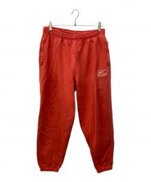 NIKE×stussy（ナイキ×ステューシー）の古着「スウェットパンツ/Pigment Dye Fleece Pants」｜オレンジ