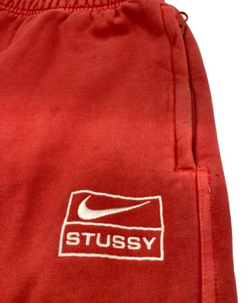 NIKE（ナイキ）NIKE (ナイキ) stussy (ステューシー) スウェットパンツ/Pigment Dye Fleece Pants オレンジ サイズ:Ｍの古着・服飾アイテム