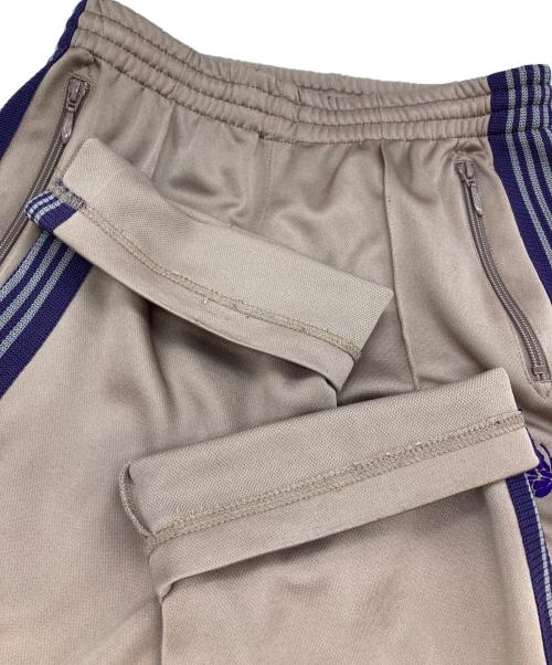 Needles（ニードルズ）Needles (ニードルズ) トラックパンツ ベージュ×パープル サイズ:XSの古着・服飾アイテム