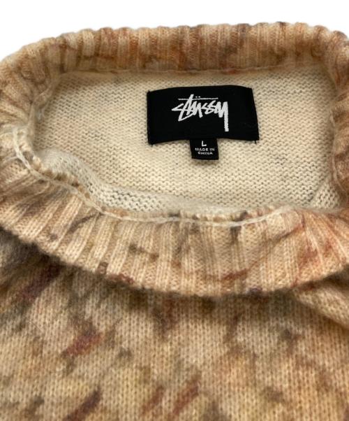 stussy（ステューシー）stussy (ステューシー) wings print sweater/総柄ニット オレンジ サイズ:Ⅼの古着・服飾アイテム