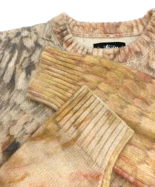 stussy（ステューシー）stussy (ステューシー) wings print sweater/総柄ニット オレンジ サイズ:Ⅼの古着・服飾アイテム