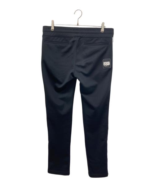 Onitsuka Tiger（オニツカタイガー）Onitsuka Tiger (オニツカタイガー) サイドボタントラックパンツ ブラック サイズ:Mの古着・服飾アイテム