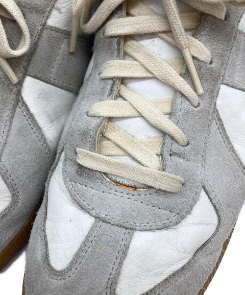 Maison Margiela（メゾンマルジェラ）Maison Margiela (メゾンマルジェラ) ローカットスニーカー/ジャーマントレーナー ホワイト×グレー サイズ:43の古着・服飾アイテム